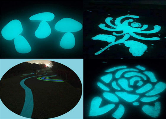 Fulgor inofensivo nos seixos escuros para a decoração da jarda